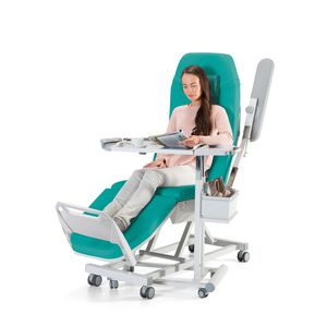 poltrona elettrica per trattamenti clinici