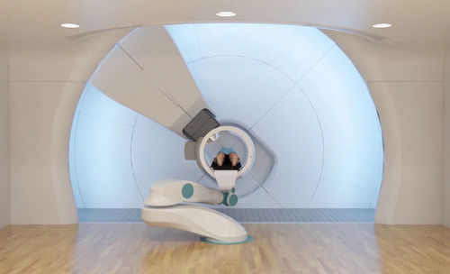 Ciclotrone per protonterapia con tavolo di posizionamento robotizzato - SC360 - Provision Healthcare - con scanner a raggi X integrato / con scanner PET integrato