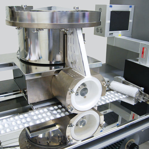 Alimentatore a vuoto - Heino Ilsemann GmbH - a vibrazione / per l'industria farmaceutica