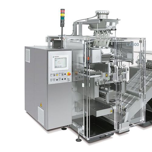 Macchina per imballaggi verticale - LA500 - Körber Pharma - Auger / per compresse / di liquidi