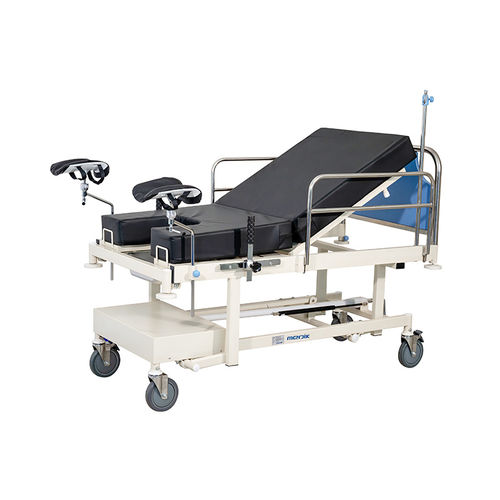 Letto da parto - MC-C14 - Zhangjiagang Medi Medical Equipment - manuale / Trendelenburg / con sistema di bloccaggio delle ruote