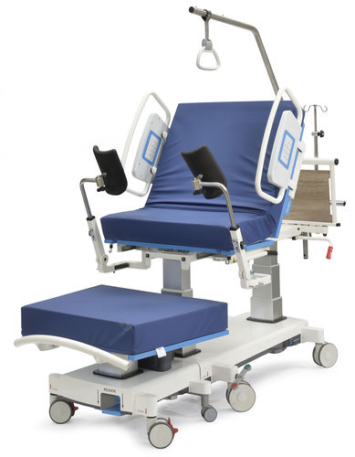 Letto da parto - Nascentia  - TechniCare - elettrico / ad altezza regolabile / con rotelle