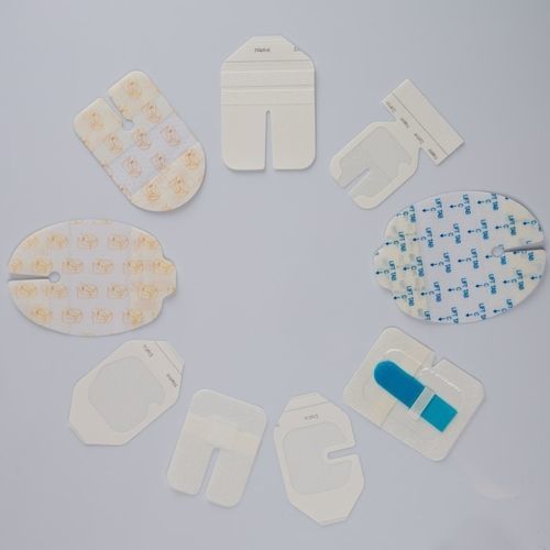 Fissatore per catetere intravenoso - KB Medical Group - per braccio / adesivo