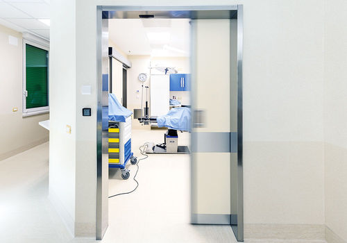Porta contro i raggi X - H-SMITE series - LABEL S.p.A. - per ospedale / scorrevole / in acciaio inossidabile