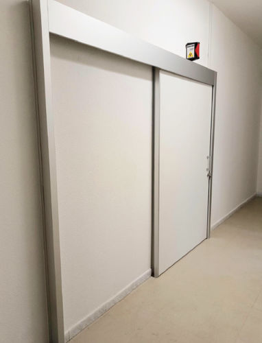 Porta di radioprotezione - MeSpo - per ospedale / scorrevole / in acciaio inossidabile