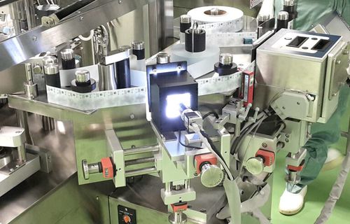 Sistema di etichettatura per siringa - SG9200 - Segae Precision Co., Ltd. - automatico / servocomandato / design compatto