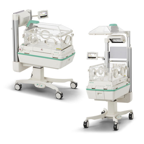Incubatrice neonatale con rotelle - Dual Incu i - Atom Medical Corporation  - con lampada per fototerapia / con tavolo di rianimazione