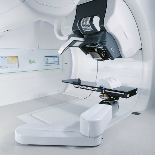 Sincrociclotrone per protonterapia con tavolo di posizionamento robotizzato - Proteus® ONE - IBA Group - con scanner a raggi X integrato
