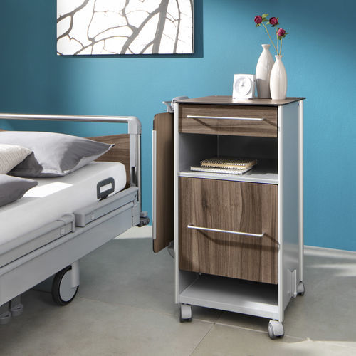 Comodino con rotelle - Soreno eco - Stiegelmeyer GmbH & Co. KG - con tavolino servitore integrato