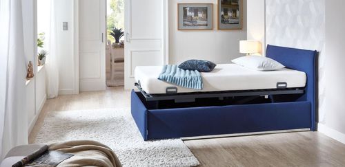 Letto per cure domiciliari - Lindeo - Stiegelmeyer GmbH & Co. KG - elettrico / ad altezza regolabile / con rotelle
