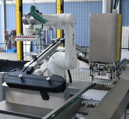 Sistema di confezionamento automatizzato - Sterisys - a pavimento / per pallet / per tubi