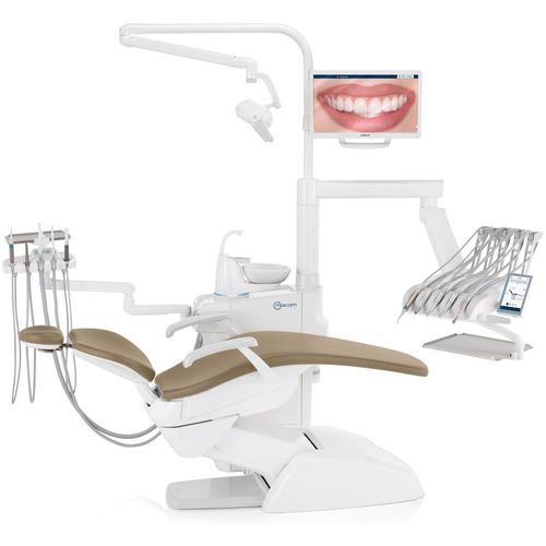 Riunito odontoiatrico con poltrona elettrica - F10  - Mocom - con poggiatesta flessibile / modulare / con monitor