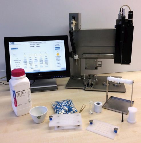 Macchina di riempimento per capsule - Kapselabfüllung - Isotope Technologies Dresden 