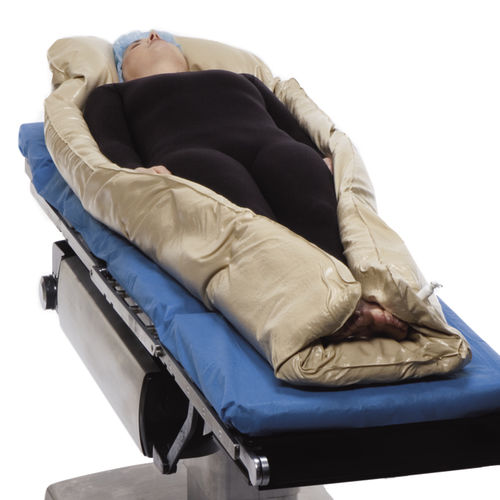 Cuscino di posizionamento - Olympic Vac-Pac® - Natus Medical - per chirurgia / in lattice / a depressione