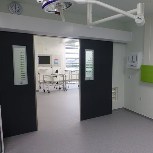 Porta di protezione - Dortek - per ospedale / scorrevole / GRP