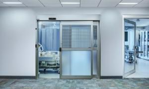 Porta per ospedale - ProCare™ 8300A - Stanley Access Technologies - per terapia intensiva / scorrevole / automatica