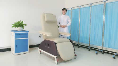 Poltrona per prelievo di sangue manuale - PY-YS upgraded - Nanning Passion Medical Equipment - idraulica / a 3 sezioni / con rotelle