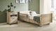 letto per cure domiciliari / elettrico / ad altezza regolabile / con rotelle