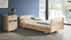 letto per cure domiciliari / elettrico / ad altezza regolabile / con rotelle